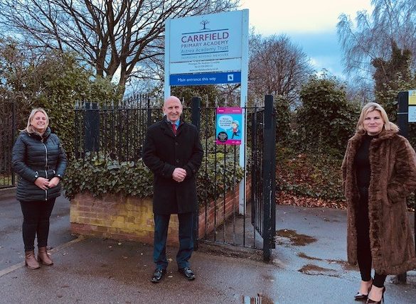 Dorothy Coates, John Healey MP and Cllr Charlotte Johnson outside Carrfield school.